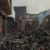 Douala, le 29 décembre 2020. Dans les décombres après l'incendie au marché Mboppi